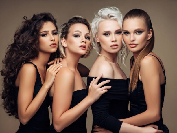 four beautiful girls with make up and hairstyle